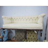 An Edwardian Mahogany Two Seater Settee, with back, arms, seat, on tapering legs, spade feet,