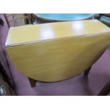 Teak Drop Leaf Dining Table; a pair of G-Plan ladder back chairs. (3)