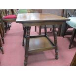 An Early XX Century Mahogany Occasional Table, with a square top, turned legs, with under shelf,