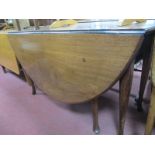 An XVIII Century Mahogany Pad Foot Table, with oval top, 150cm wide, 72cm high.