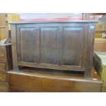 A 1930's Oak Blanket Box, with lift-up lid and three panel front, on stile feet, 89.5cm wide.
