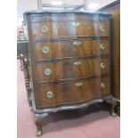A Mahogany Bachelors Chest, with brush slide over four serpentine fronted graduated drawers, blind