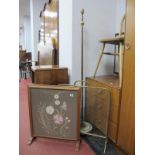 An Oak Firescreen, with embroidered panel; together with a brass firescreen and an onyx lamp