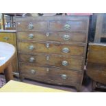 An Early XIX Century Mahogany Chest of Drawers, with two short drawers, three long drawers, on