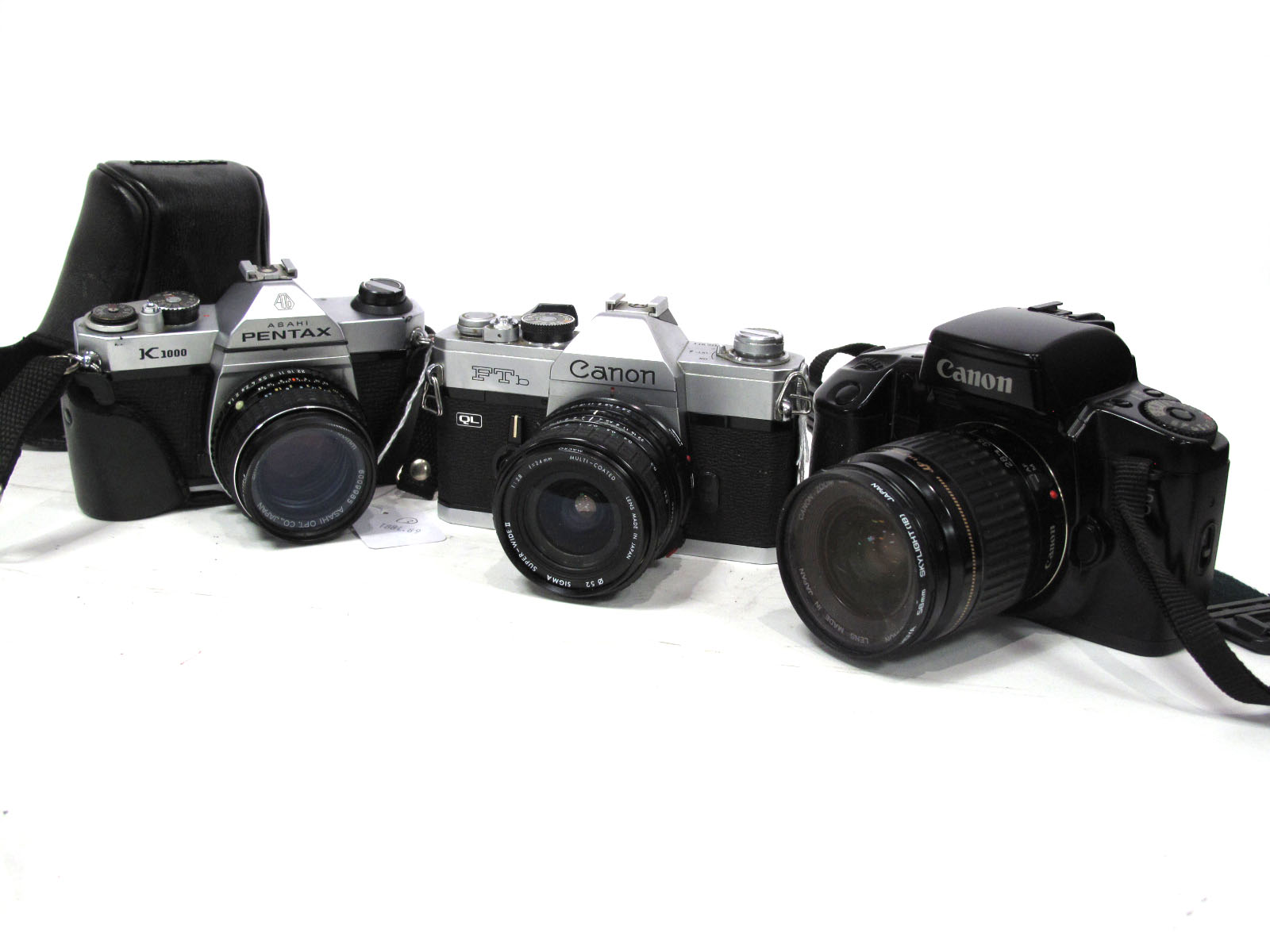 Pentax Asahi K1000, with SMC Pentax M 50mm lens, Canon FTb Camera with Sigma Super-Wide Z, f=24mm