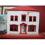 A Large C.1930's Dolls House, with some contemporary and later contents.