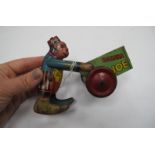 Tin Plate Peter Pan Toys, Banana Joe with wind up mechanism. The Red Wheels 4cm diameter.