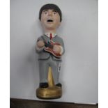 Paul McCartney, pot model with name to base, 24cm high.