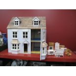 A Grey Painted Dolls House, double opening front 62cm wide, together with a quantity of