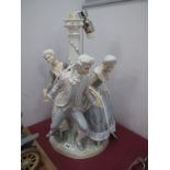 A Lladro Tarantela Pottery Table Lamp, featuring three Regency figures holding hands numbered N-