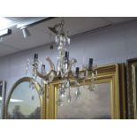 A Mid XX Century Glass Five Branch Chandelier, having faceted lustre drops.