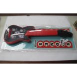 Rolling Stones Plastic Toy Guitar, 40.5cm long in oriiginal wrapping.