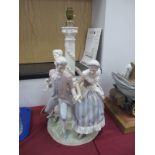 A Large Lladro Figural Table Lamp, "La Tarantella" depicting two Regency ladies and gentlemen