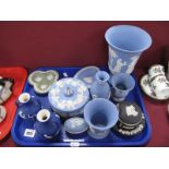 Wedgewood Jasperware, to include large pale blue vase, smaller vase, tulip vase, dark blue double