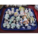 A Large Quantity of Continental Porcelain Pin Cushion Dolls, various sizes:- One Tray