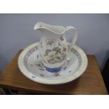 A Wedgwood "Sarah's Garden" Toilet Jug and Bowl.