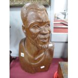 A XX Century Cared African Tribal Head, shoulders of a bearded man 43cm high.