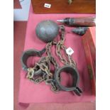 WITHDRAWN An Early 1900's Ball & Chain, with lockable anklets.