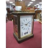 Matthew Norman of London Brass Cased Carriage Clock, 14cm high with handle down.