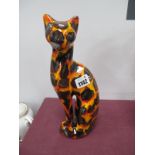 An Anita Harris Hot Coals 'Serene Cat', gold signed, 28cm high.