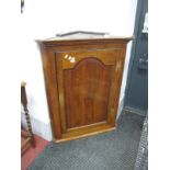 A Georgian Oak Flat Front Corner Wall Cupboard, with stepped pediment, 81cm wide.