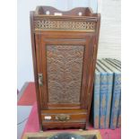 A Victorian Mahogany Smoker's Cabinet, gallery top with brass piercing, two drawers, internal pipe