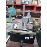 Griffin & George Industrial Microscope, a further microscope and an ammunition box.(3)