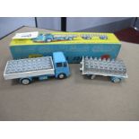 Corgi Toys Gift Set No. 21, featuring E.R.F Dropside Lorry and Platform Trailer with milk churns, in