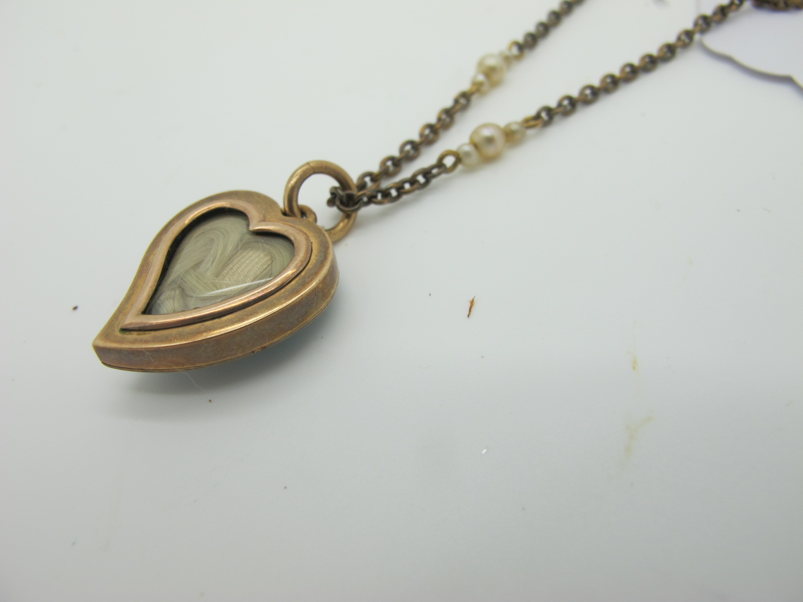 A Pearl Set Heart Shape Locket Pendant, highlighted in turquoise and white enamel, the glazed - Image 4 of 4