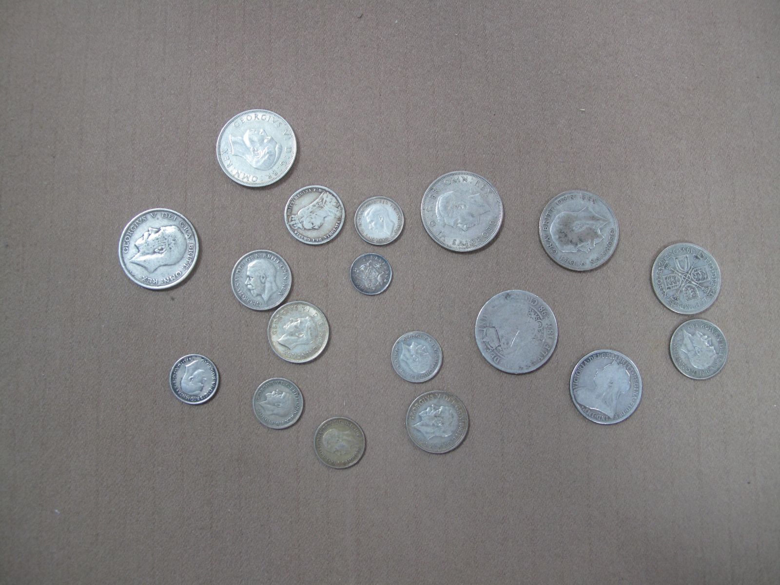 A Collection of Pre 1947 Silver GB Coins, includes Half Crowns, Florins, Shillings etc, total weight