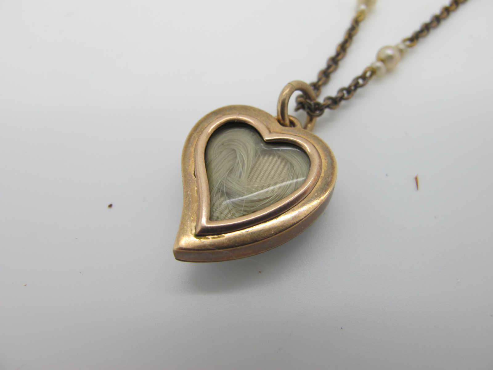 A Pearl Set Heart Shape Locket Pendant, highlighted in turquoise and white enamel, the glazed - Image 3 of 4