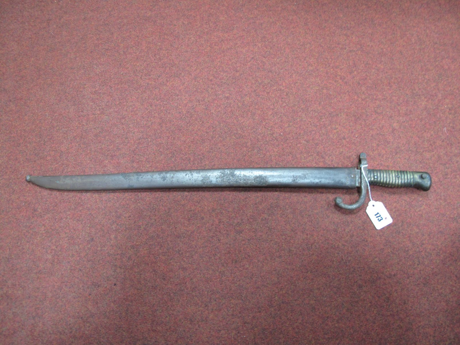 A French XIX Sabre Bayonet, chips, rusting to blade, with metal scabbard.