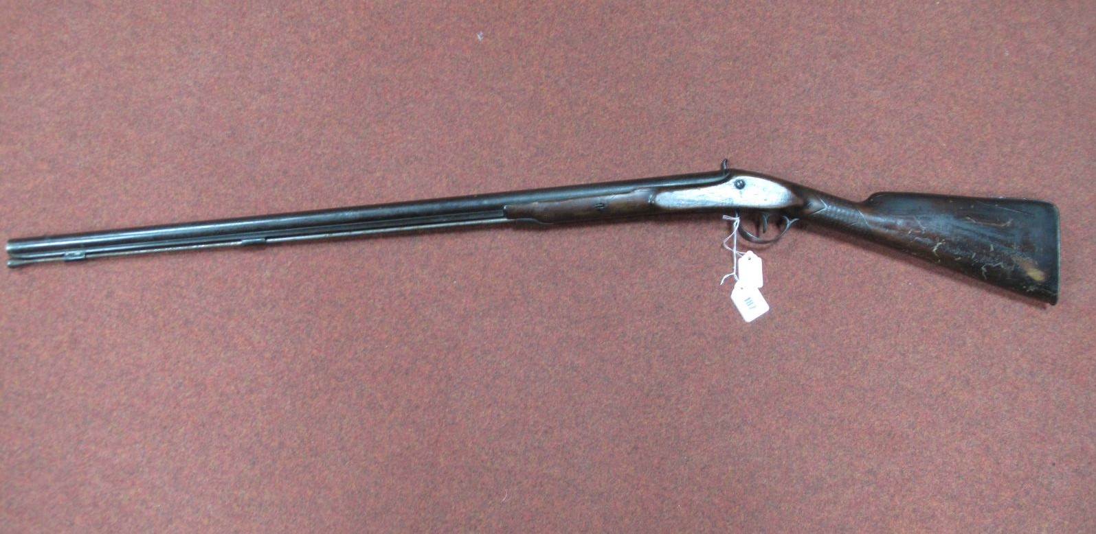 A XIX Century Percussion Sporting Gun, signs of restoration and alteration, formally flintlock.