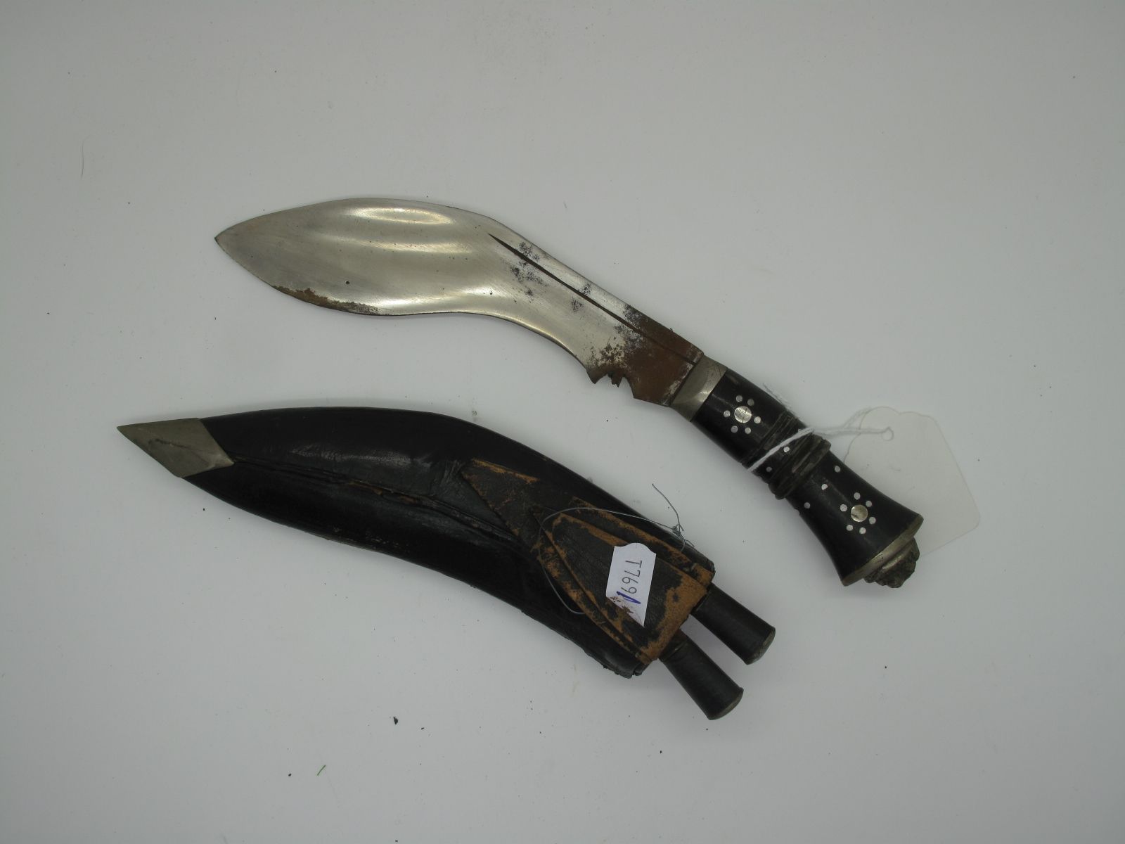 A Small Kukri Knife and Scabbard.