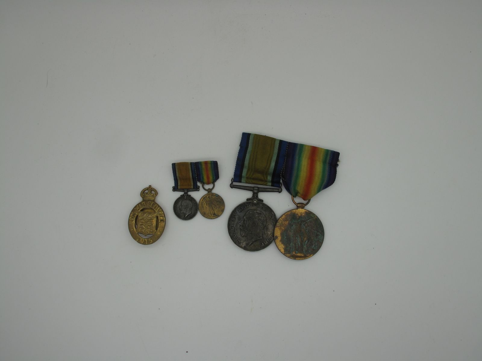 A WWI Medal Pair Comprising War Medal and Victory Medal to S/Lt N.J Coombes, RVR plus miniatures and