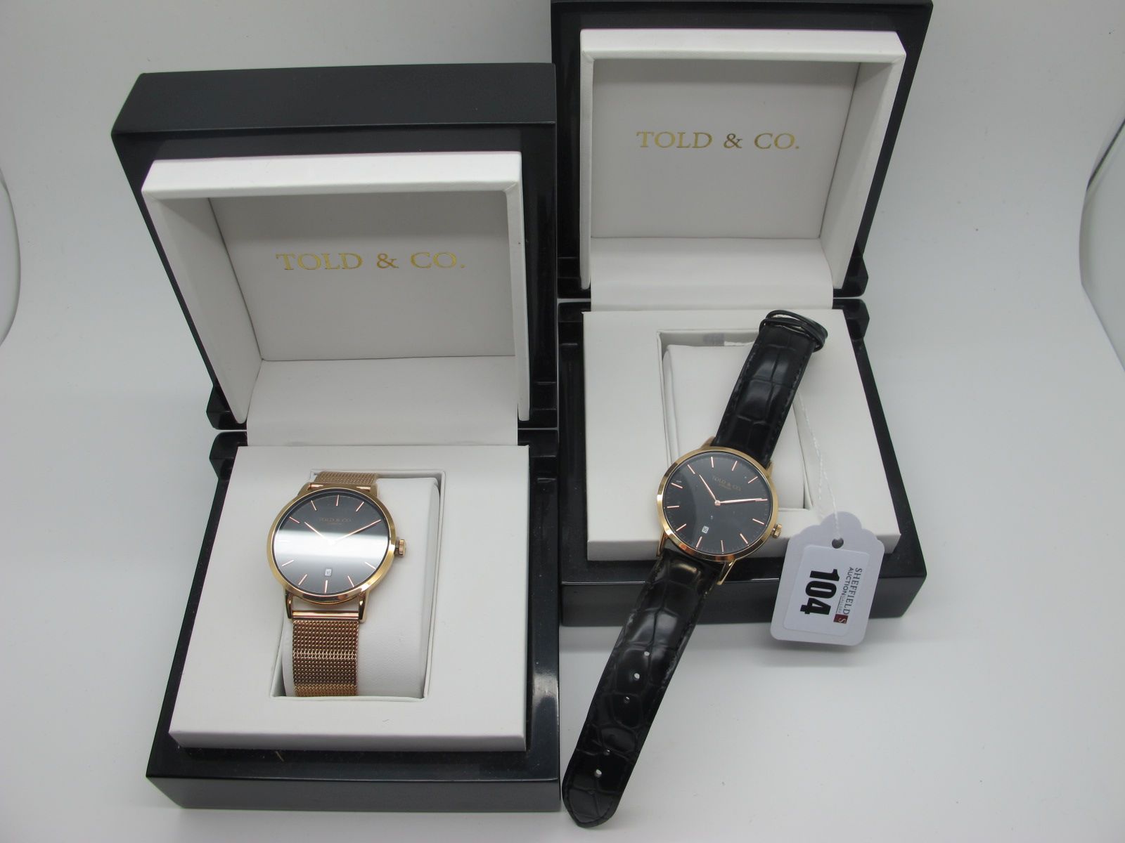 Told & Co; A Modern Gent's Wristwatch, the signed black dial with line markers and date aperture, on