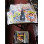 A Quantity of MAD Magazines 1980 - 1990, all in cellophane, unchecked for complete runs:- One Box.