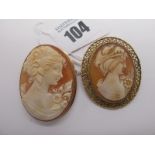 An Oval shell Carved Cameo Brooch/Pendant, collet set within plain mount, stamped "Italy 9KT";