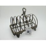 A Victorian Hallmarked Silver Seven Bar Toast Rack, Messrs Barnard, London 1845, with central loop