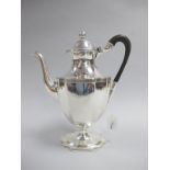 A Georgian Plated Coffee Pot, of tapering form, with engraved band, on shaped spreading base,