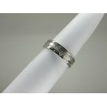 A Modern 18ct White Gold Diamond Set Band, of uniform satin and polished finish, rubover set