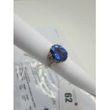 A Modern Loriqué Limited Edition 18ct Gold Single Stone Tanzanite Ring, oval four double claw set