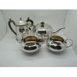 A Plated Three Piece Tea Set, of plain compressed circular form, together with a XIX Century