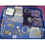 A Collection of Assorted Modern Costume Jewellery, including sliding bead charm bracelets,