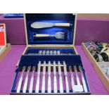 A Late XIX Century Cased Matched Set of Decorative Plated Cutlery, with hallmarked silver