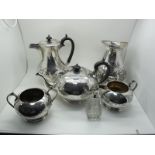 A C.Bros Plated Four Piece Tea Set, with foliate decoration; Together with a Decorative Hand