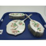 A Vintage Adie Bros Enamel Backed Three Piece Dressing Table Set, detailed with flowering pink