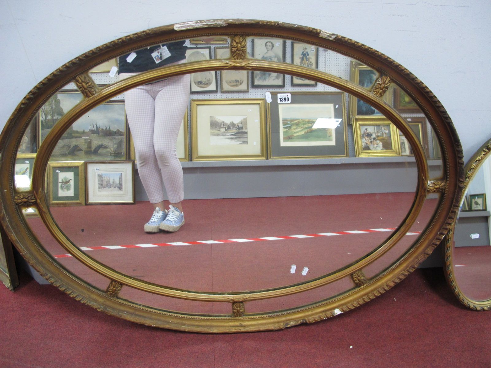 A Large Gilt Framed Oval Wall Mirror, circa early XX Century, with inner band united by floret's,