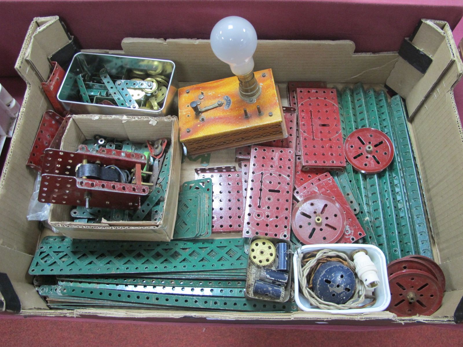 A Quantity of Meccano, to include No 2 electric motor and Rheostat controller, pulleys, playworn