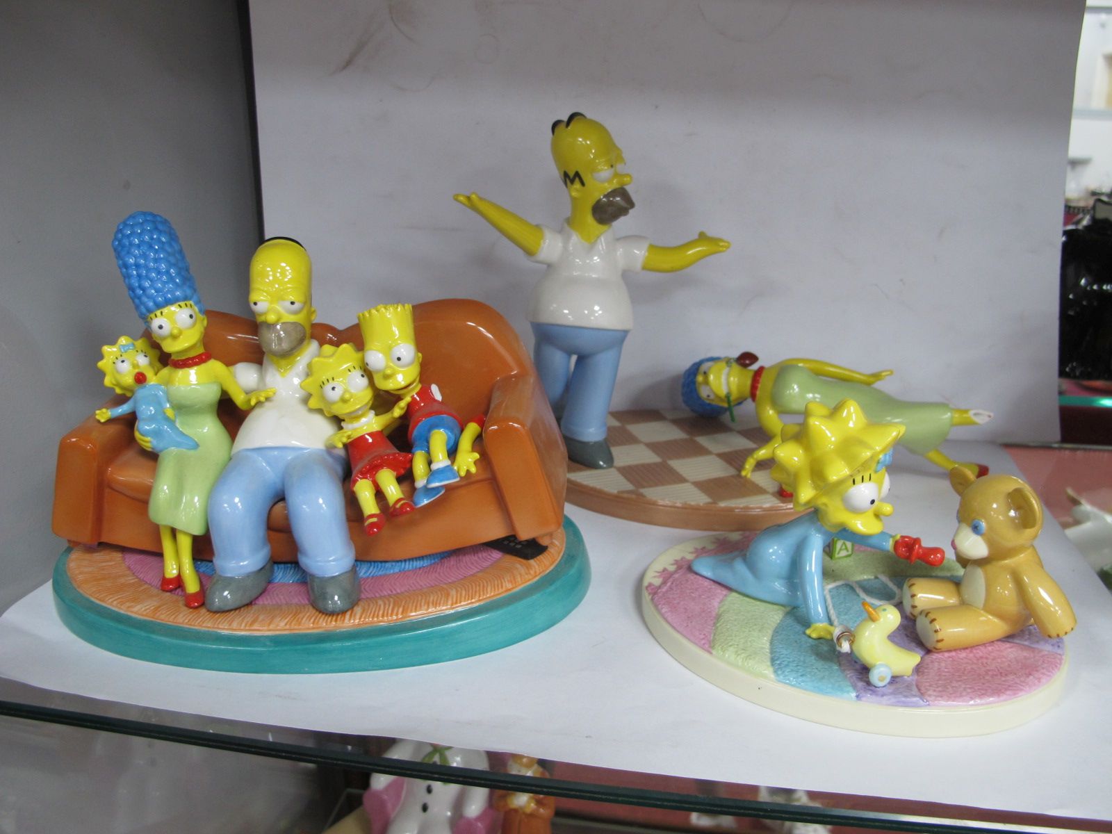 Coalport The Simpsons, 'Two to Tango' (damaged), The Family That Sits together (damaged) and The